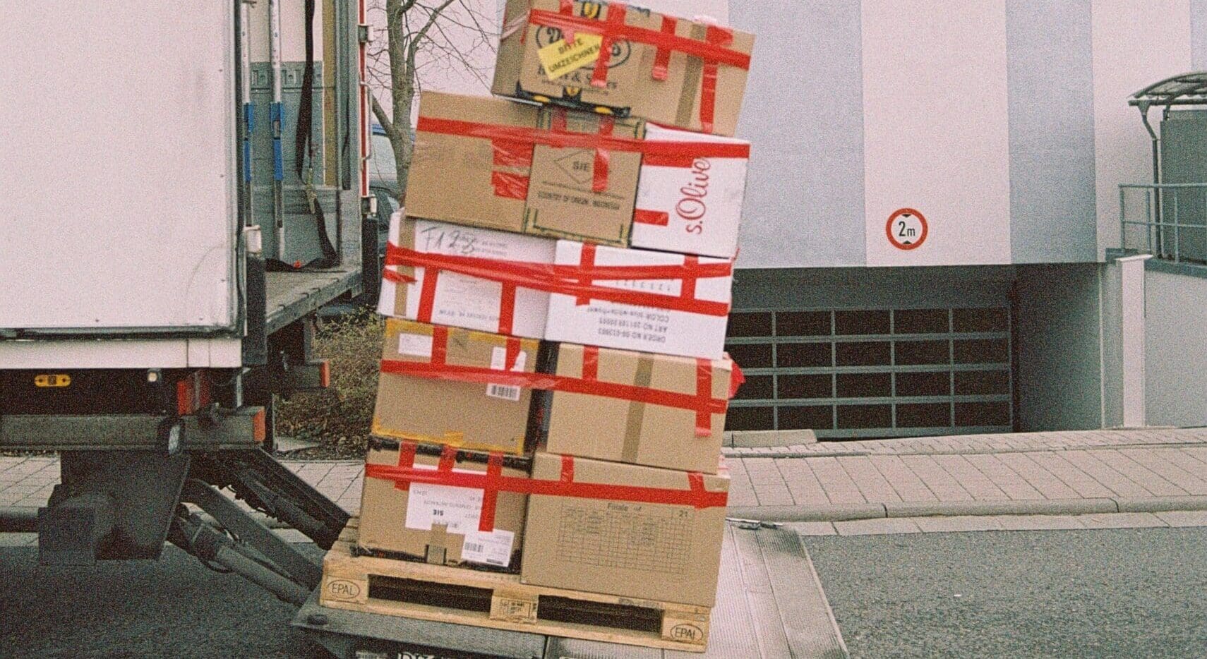 Moving boxes on the back of a moving truck